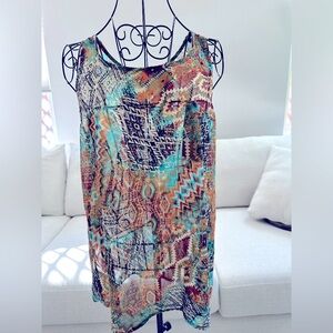 Sheer tunic tank with open back detail
